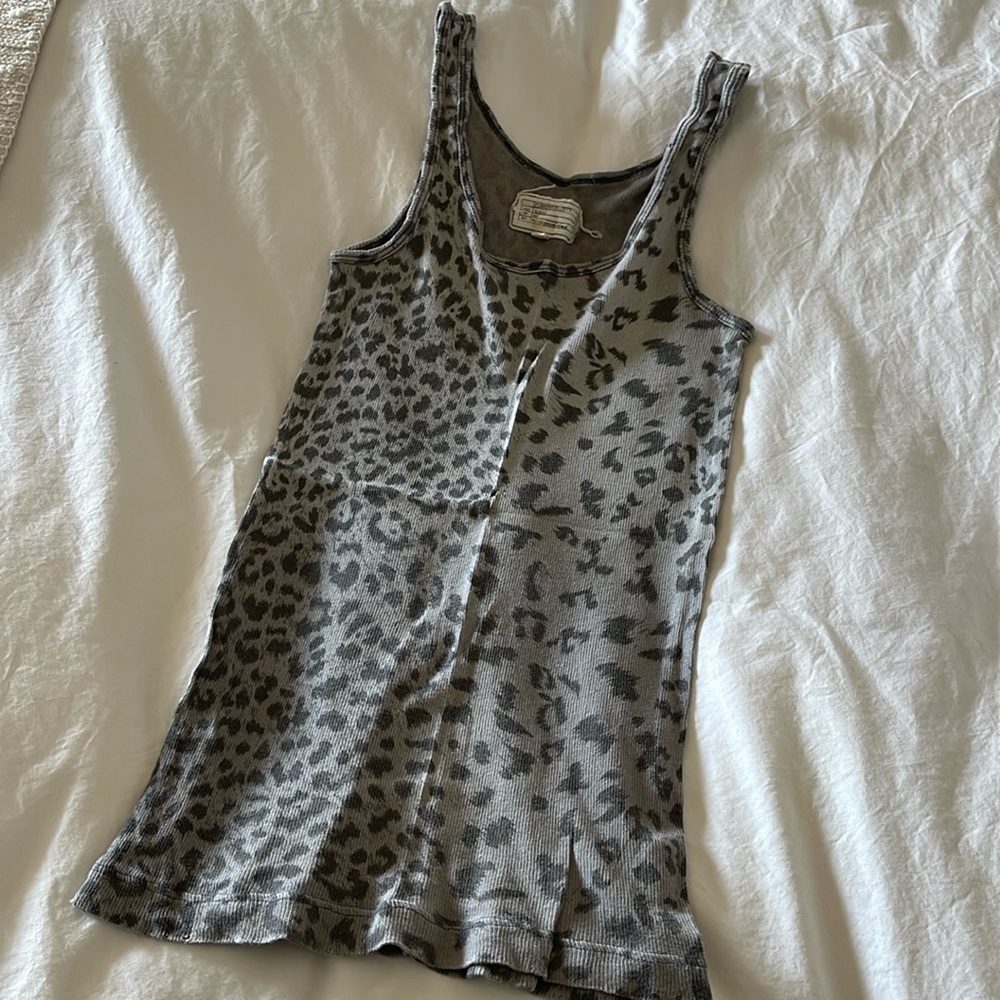 Incredibly soft leopard print tank with intentional wear on the seams